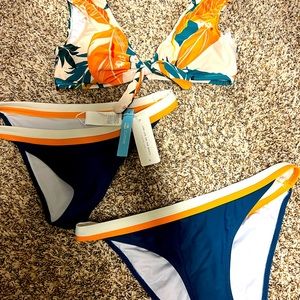 CUPSHE swimsuit with small and medium bottoms.